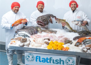 Fishmongers Showing Of Catch & Fresh Fish On Ice